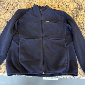 Great used condition navy blue Figs fleece jacket. Size Medium